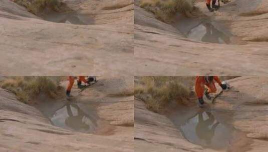 宇航员，水坑，沙漠，橙色高清在线视频素材下载