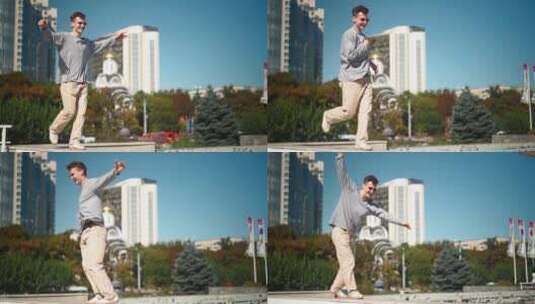 男人在办公楼前开心的旋转舞蹈高清在线视频素材下载