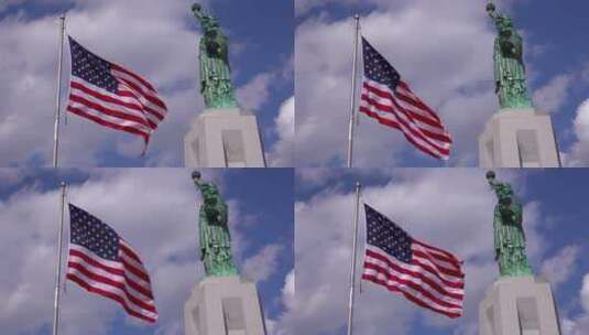 自由女神像和飘扬的美国国旗高清在线视频素材下载