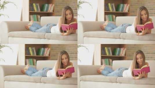 女孩在沙发阅读书籍高清在线视频素材下载