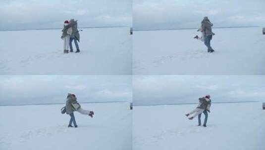情侣在雪地上拥抱高清在线视频素材下载