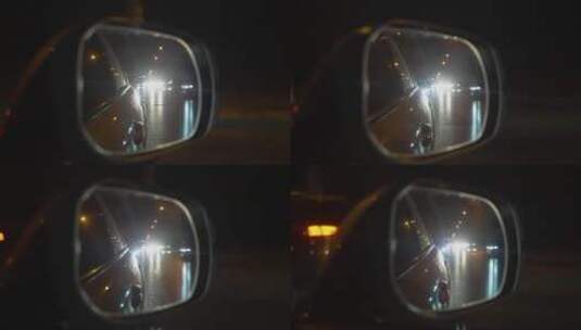 行驶时后视镜里的车灯高清在线视频素材下载