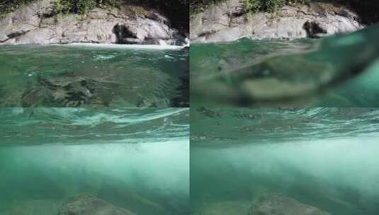 在青绿色的小溪中潜水高清在线视频素材下载