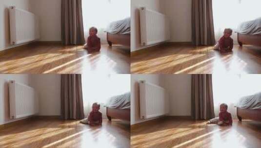 可爱小婴儿在地板上爬行学步高清在线视频素材下载