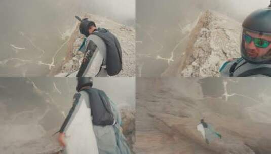 冒险者穿着翼服跳下山崖  高清在线视频素材下载