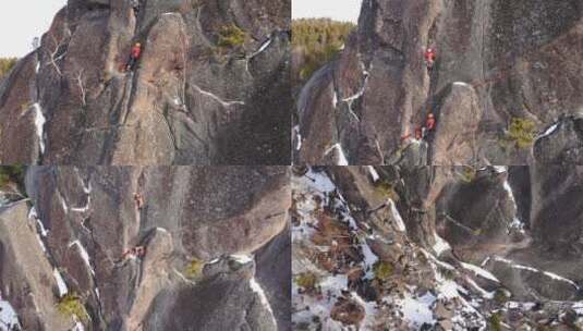 航拍两名登山者在攀岩高清在线视频素材下载