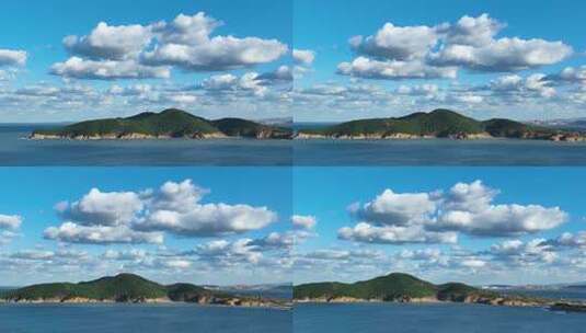 航拍蓝天白云下的威海刘公岛高清在线视频素材下载