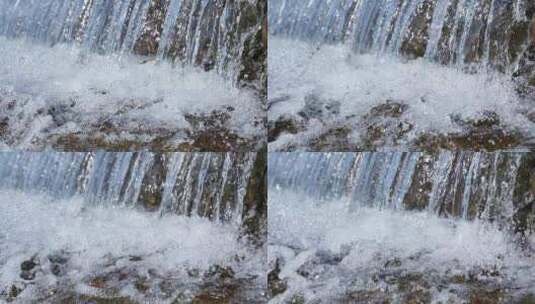 清澈的溪水水流和白色水花慢镜头高清在线视频素材下载