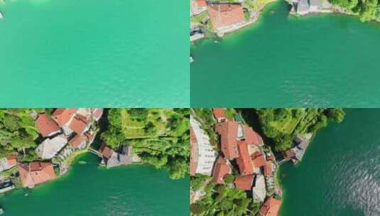 鸟瞰意大利科莫湖畔风景如画、色彩缤纷的村庄Nesso高清在线视频素材下载