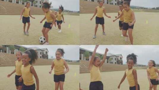 快乐的多样化女孩在学校前踢足球的视频高清在线视频素材下载