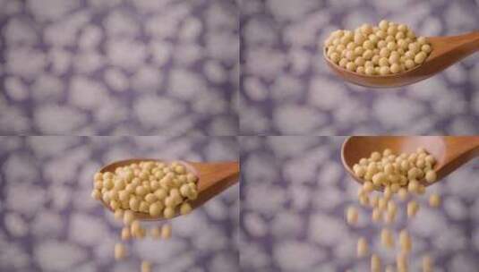 黄豆大豆在木勺里掉落高清在线视频素材下载