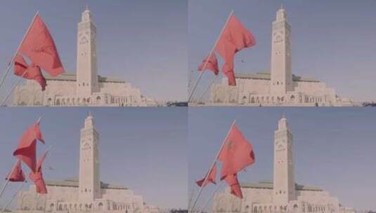 摩洛哥卡萨布兰卡哈桑二世清真寺前飘扬的旗高清在线视频素材下载