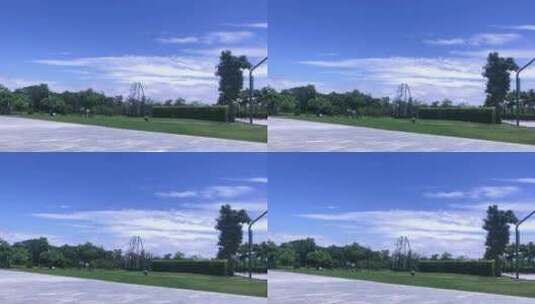蓝天白云下 公园草地维护 6408高清在线视频素材下载