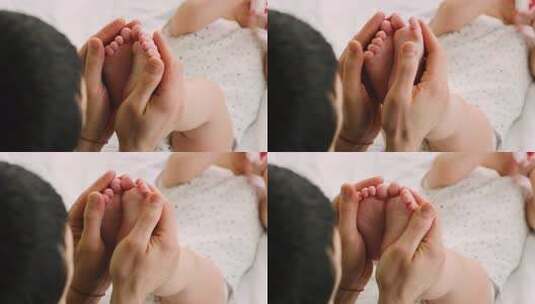 小婴儿父亲抱着腿高清在线视频素材下载