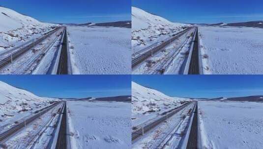 东北山谷雪原，铁路公路并行的广阔景象高清在线视频素材下载