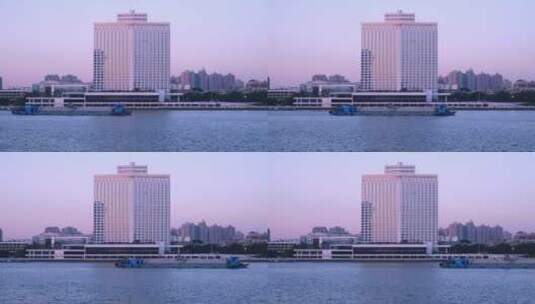 广州白天鹅宾馆建筑与珠江货船夕阳晚霞风光高清在线视频素材下载