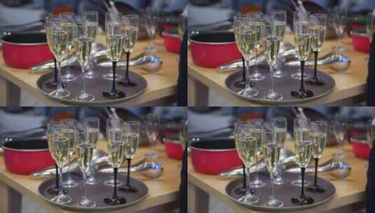 托盘中的香槟酒杯高清在线视频素材下载