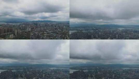 乌云密布下的城市航拍空镜头高清在线视频素材下载