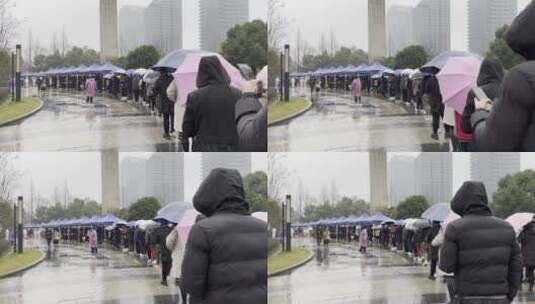 下雨天市民排队在城市广场上做核酸高清在线视频素材下载