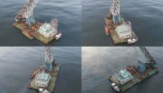 航拍威海高区海面上的一条航吊船高清在线视频素材下载