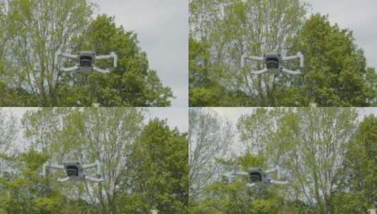 低角度拍摄在空中悬停的无人机高清在线视频素材下载