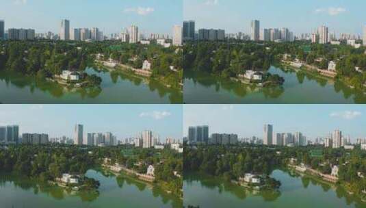 重庆财富中心别墅区湖与城市CBD建筑航拍高清在线视频素材下载