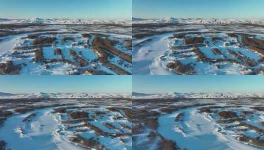 冬季湿地积雪覆盖的远山雪原风光高清在线视频素材下载