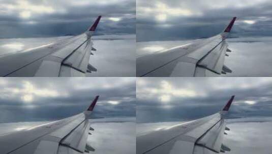 从飞行中的飞机窗户向外看视角高清在线视频素材下载