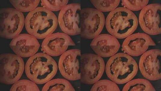 西红柿切片平铺在锅里的特写高清在线视频素材下载