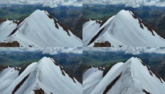 航拍攀登沙鲁里山脉尼登贡嘎雪山的登山者高清在线视频素材下载