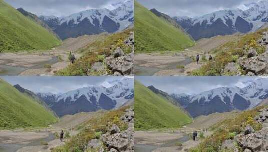 攀登那玛峰的登山者在山林田野中徒步行进高清在线视频素材下载