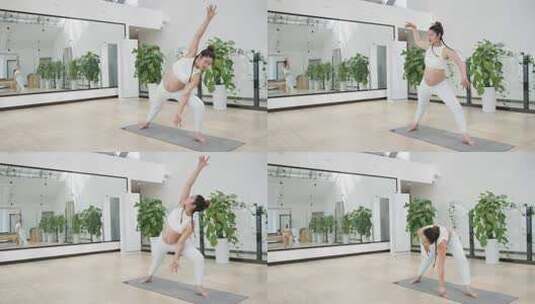 怀孕的现代女性在健身房锻炼身体练习瑜伽高清在线视频素材下载