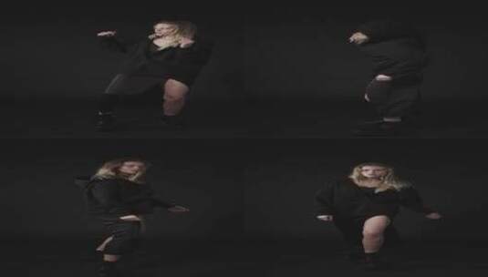 穿着黑色连衣裙的模特在跳舞高清在线视频素材下载