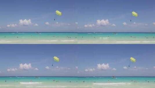 滑翔伞在海洋上空滑行高清在线视频素材下载