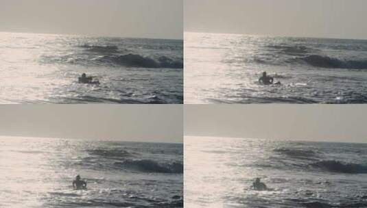 在冲浪板上冲浪的男人高清在线视频素材下载