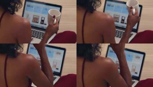 黑人女孩喝咖啡使用电脑网络购物高清在线视频素材下载