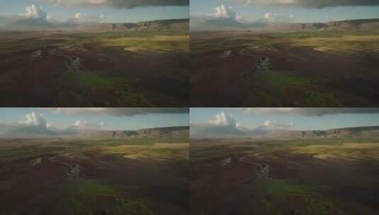 FPV穿越机无人机航拍草原河流山脉蓝天白云高清在线视频素材下载