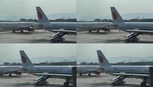 飞机停靠在广西桂林机场航站楼高清在线视频素材下载