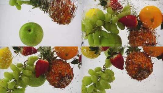 苹果，猕猴桃，柠檬，葡萄，菠萝落入水中高清在线视频素材下载