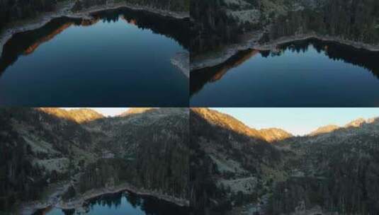 航拍盆地湖面与高山阳光高清在线视频素材下载