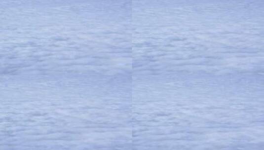 飞机上俯瞰平流层上白色云层高清在线视频素材下载