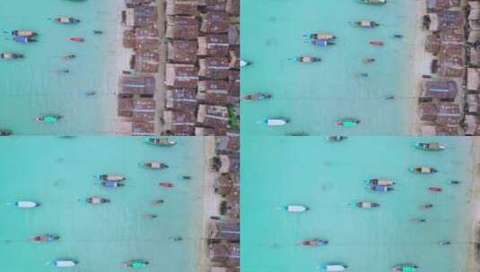 泰国绿松石色水域中长尾船在海滩上的木屋上高清在线视频素材下载