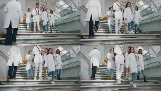 医生学生，团队行走和楼梯在医院的对话与合高清在线视频素材下载