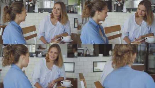 坐在餐馆聊天喝咖啡的女人高清在线视频素材下载
