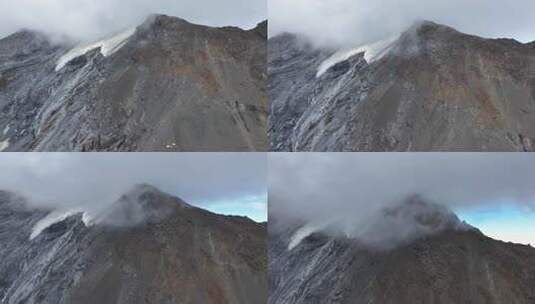 航拍攀登岷山山脉雪宝顶雪山的登山者C1营地高清在线视频素材下载