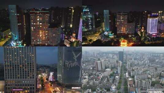 城市夜景中灯光璀璨的高楼建筑高清在线视频素材下载