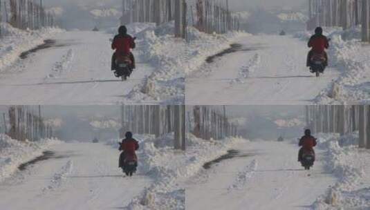 雪地道路骑电动车行走的男子背影高清在线视频素材下载