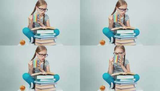 女孩坐在坐着看书高清在线视频素材下载