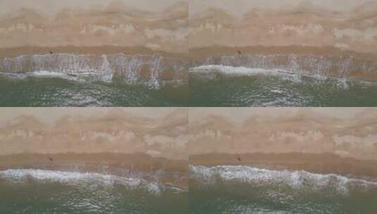 俯拍沙滩海浪大海风光高清在线视频素材下载