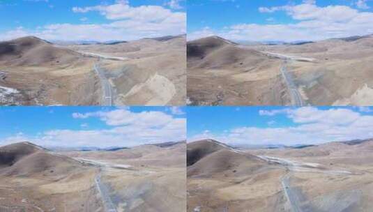 蓝天白云下藏区高原的318国道高清在线视频素材下载